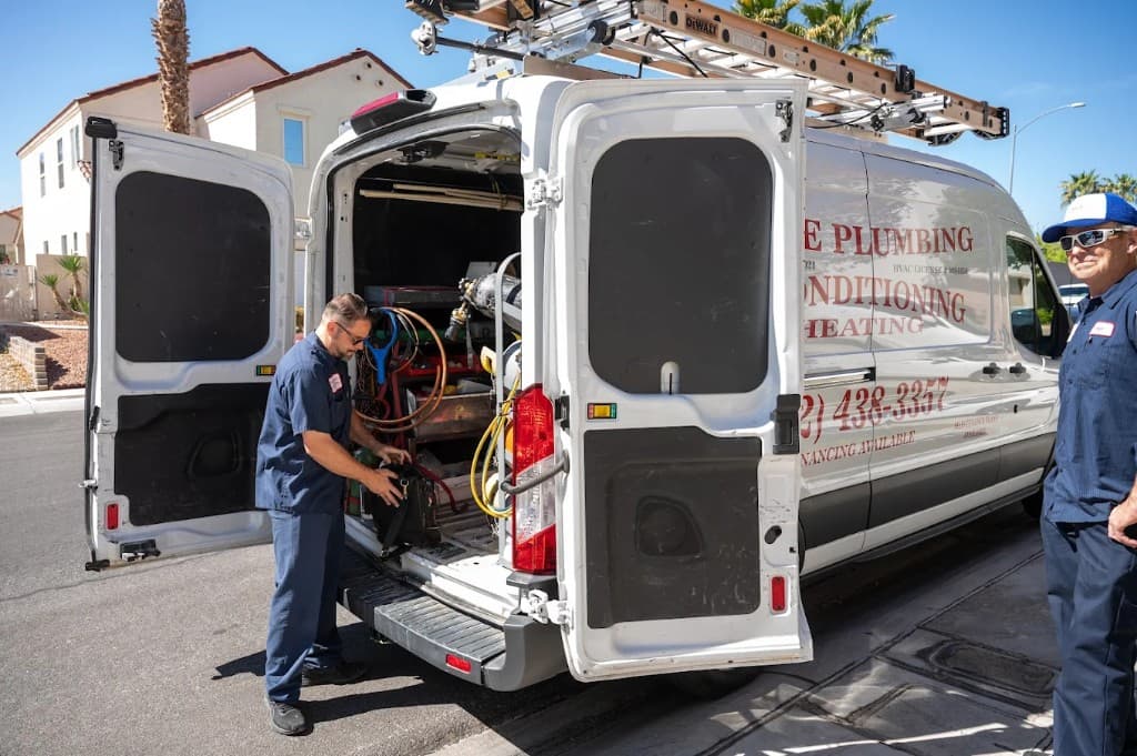 Active Plumbing trucks and crews serving homeowners across Las Vegas and Las Vegas Valley. Active Plumbing team members with their fully equipped service van in a Las Vegas–area neighborhood.